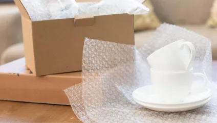 数百セット単位のギフト梱包と販促物封入を短納期で完了